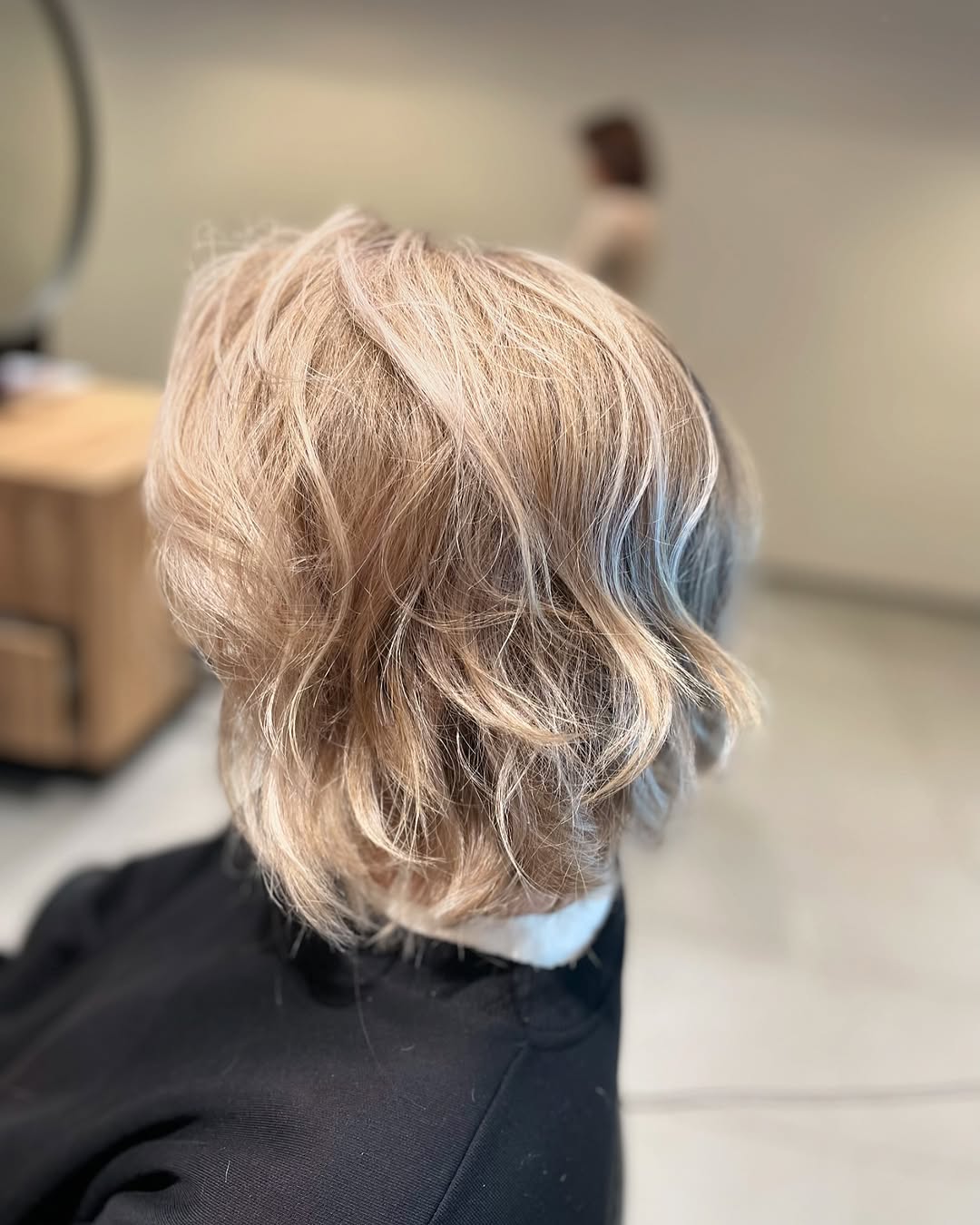 Blonde bob met beweging en lichte slag